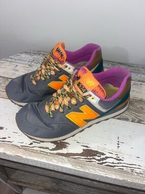 New Balance Women’s 574 Gray and Orange Casual Sneakers